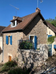 Charmante maison nichée dans un écrin de verdure