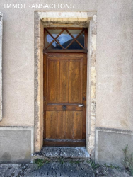 Maison ancienne avec garage et jardin
