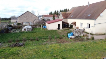 Maison ancienne de village avec garage et jardin