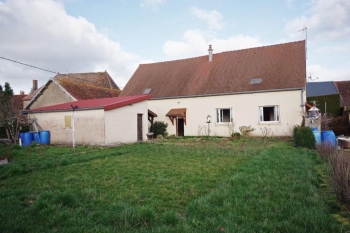 Maison ancienne de village avec garage et jardin