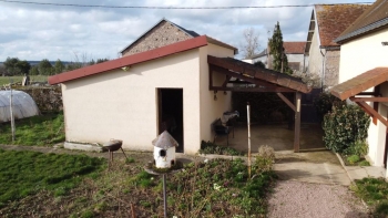 Maison ancienne de village avec garage et jardin