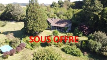 Propriété sur jardin clos et arboré en pleine nature